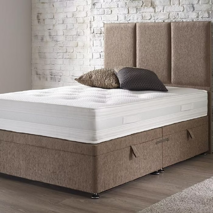 Alt Tag: Lullaby Pocket Mattress on upholstered divan bed with tufted headboard, quilted surface, and pocket spring comfort support