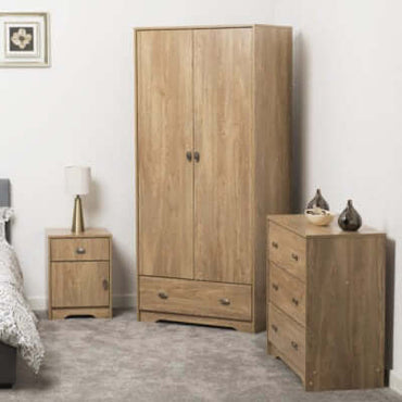 Attenborough Trio Bedroom Furniture Set Medium Oak wardrobe, bedside table and 3-drawer chest in modern rental-ready bedroom