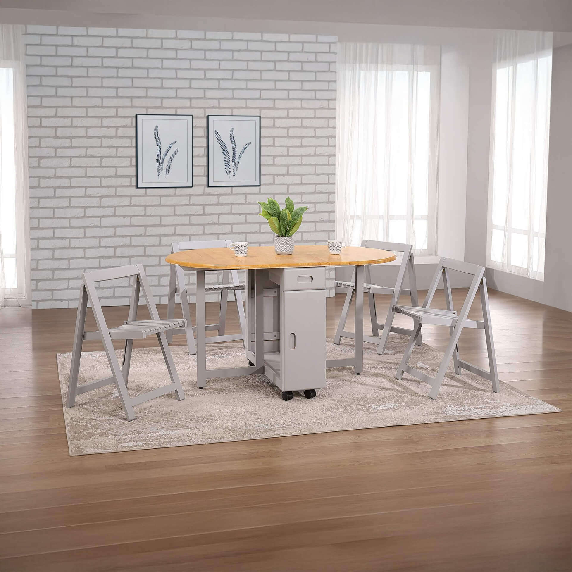 Butterfly Dining Set – Space-Saving Style with 4 Chairs - Oak & Grey oval drop-leaf table with four grey chairs in bright dining room