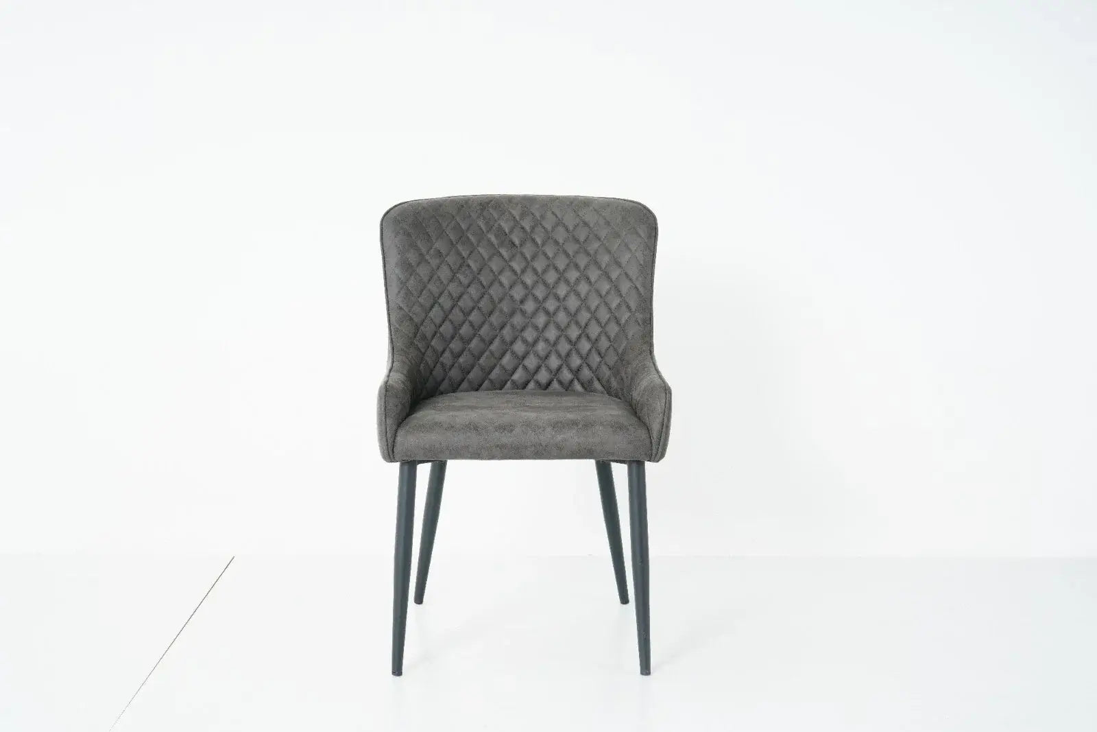 Alt Tag: Suede Oxford Fabric Dining Chairs grey quilted dining chair with padded seat and black legs