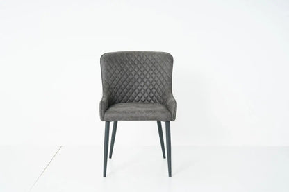 Alt Tag: Suede Oxford Fabric Dining Chairs grey quilted dining chair with padded seat and black legs