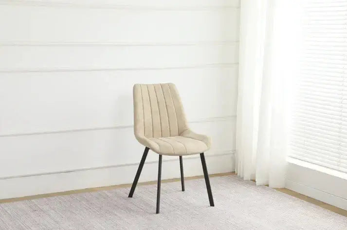 Alt Tag: Isla Dining Chairs - Upholstered beige fabric dining chair with padded seat and black legs, Scandinavian style
