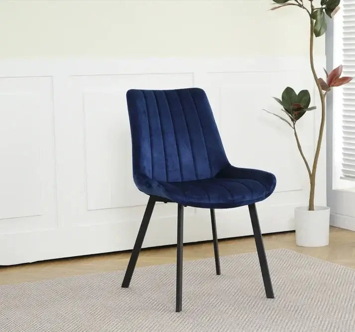 Alt Tag: Isla Dining Chairs - Upholstered blue fabric dining chair with padded seat and black legs, Scandinavian modern style