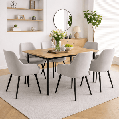 Alt Tag: Ruby Dining Chairs - Upholstered light grey fabric dining chairs around oak table in modern dining room setting