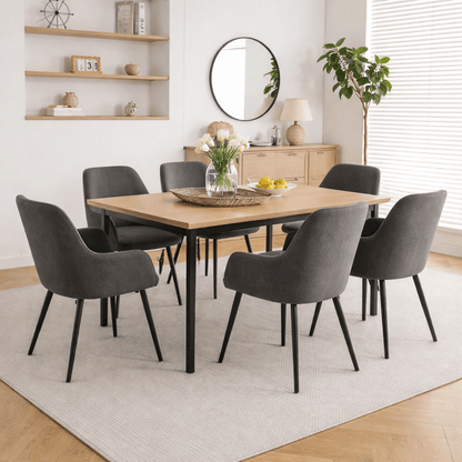Ruby Dining Chairs - Upholstered charcoal fabric dining chairs around modern wooden dining table in bright contemporary dining room