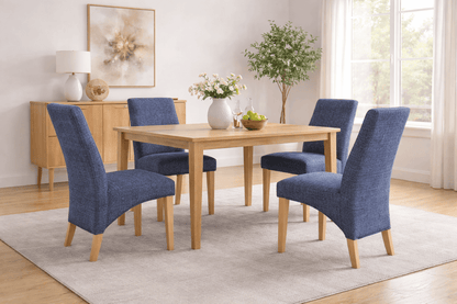 Upholstered "Dexter" Waveback Dining Chairs in blue textured fabric with oak legs around a wooden dining table in a modern dining room