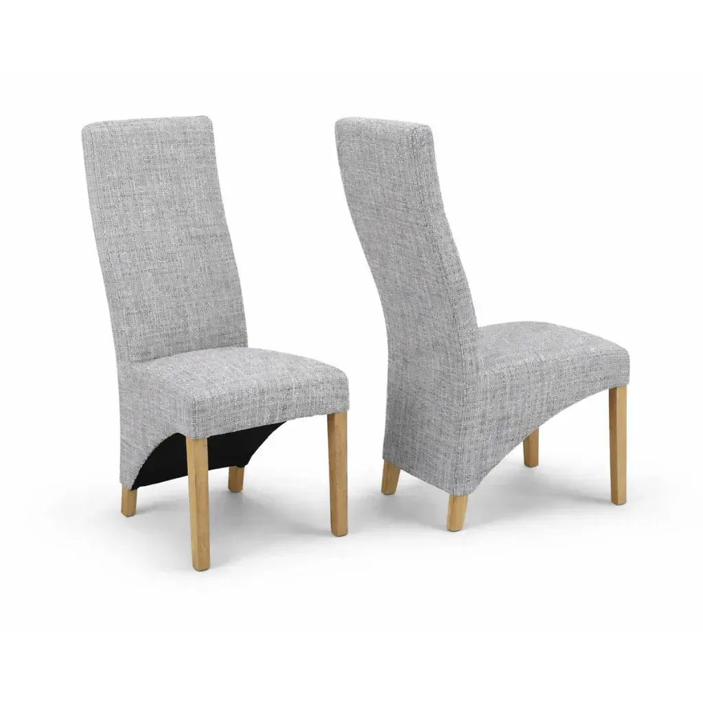 Alt Tag: Upholstered "Dexter" Waveback Dining Chairs in textured grey fabric with solid oak legs, modern padded dining chair set